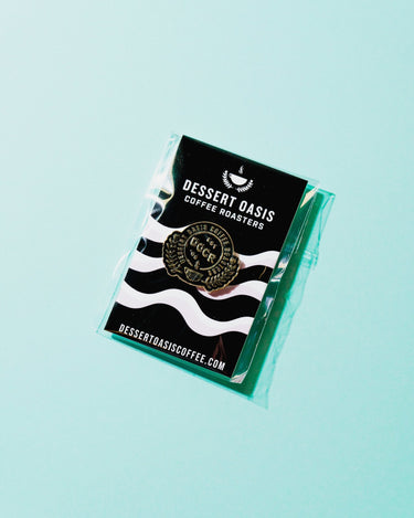 DOCR Enamel Pin - Dessert Oasis Coffee Roasters